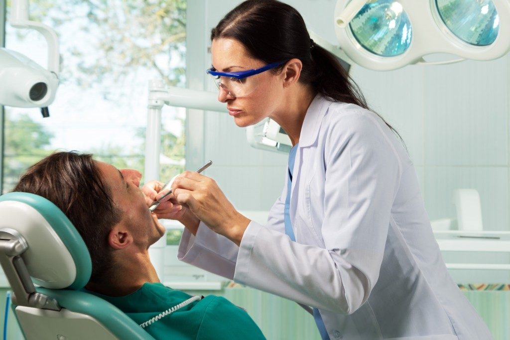 Dentist with Patient