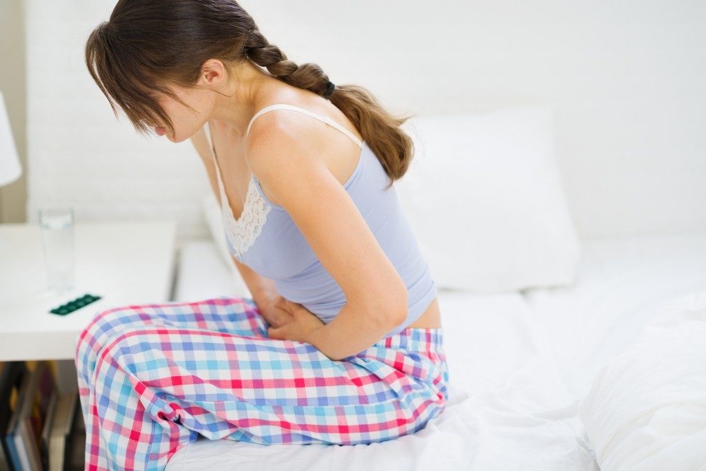Woman suffering from cramps