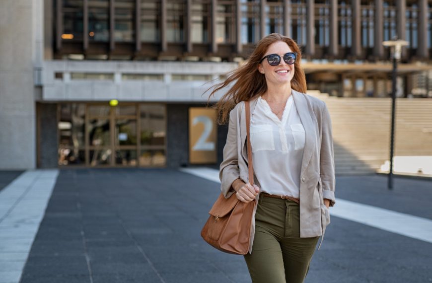 confident businesswoman walking to work